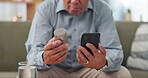 Phone, medicine and mature hands with home research, reading label and learning of telehealth services. Online person with pills bottle, tablet and mobile for safety and health benefits on the sofa