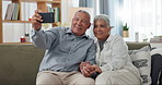 Senior couple, selfie and sofa with love, social media and happy together in a home. Retirement, marriage and profile picture with elderly people in a house on a website online with support and trust