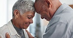 Love, hug and senior couple in their home for support, happy together and affection with laugh or smile. Elderly woman and man with eyes closed for prayer in marriage, mindfulness and romance or care