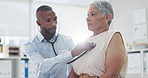 Stethoscope, examination and doctor with senior woman at hospital for lungs, chest or breathing assessment. Heart, listen and elderly patient consulting cardiologist for heartbeat, pulse or checkup
