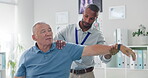 Old man, physiotherapist and arm stretching for training mobility in retirement or rehabilitation, wellness or injury. Elderly person, muscle support and performance help, recovery or consultation