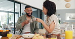 Coffee, toast and couple in a kitchen for breakfast, bonding or romantic anniversary celebration. Food, love and happy people with cheers support for Valentines day brunch, meal or diet and nutrition