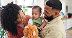 Parents, baby and teddy bear in family home with hug, talking and care with development in childhood. Mother, father and child with toys, playing and bonding for connection with love in apartment