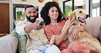 Happy couple, relax and watching tv with dog on sofa for entertainment, show or movie in living room at home. Man and woman with smile, remote and pet for online streaming, series or bonding at house