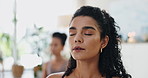 Breathing, woman and meditation in yoga class for wellness and health with breathing. Zen, relax and calm female person with women in a lounge with spiritual practice for care and mental health