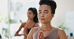 Meditation, woman and breathing in yoga studio for health, wellness and care in living room. Calm, relax and peace of a African female person with spiritual practice in a house for zen with namaste