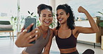 Workout, women and selfie in home with laughing, funny and strong muscle for social media. Happy, girl friends and exercise in a lounge with profile picture of fitness and training with a smile