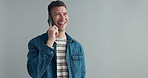 Phone call, mockup and happy man in studio speaking, listening or web communication on grey background. Smartphone, conversation and male model smile for contact chat, gossip or friendly discussion
