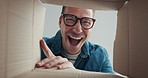 Man, excited with smile for box and perspective, package or parcel with delivery or moving into new house. Cardboard, open gift or present with happy face, unboxing with cargo or stock for relocation