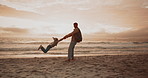 Father, swing and child at beach for vacation with sunset, balance and strong for bonding, care and love. Person, dad and kid with game, lift or playful by ocean on holiday for connection in winter