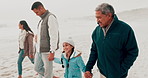 Beach, family and grandparents with children in nature for holiday, vacation and adventure in winter. Family, travel and mother, father and kids holding hands for bonding, walking and relax by sea