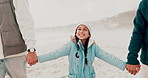 Nature, beach and child holding hands with parents outdoors on holiday, vacation and weekend. Winter, travel and happy young girl walking with family for bonding, adventure and relax together by sea