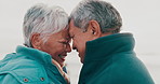 Senior couple, forehead and love at beach with smile, care or connection for relationship on vacation. Elderly man, old woman and people with romance, memory or touch for holiday by sea in retirement