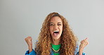 Excited woman, fist pump and celebration with deal, promotion or winning on a gray studio background. Portrait of happy female person or young winner with smile in surprise for bonus on mockup space