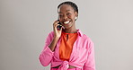 Happy, phone call and face of black woman laughing in studio with web, connection or news on grey background. Funny, portrait or female model with smartphone conversation, app or silly communication