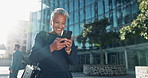 Senior woman, walking and happy with texting on smartphone in outdoor with laugh, smile and conversation. Lens flare, corporate and female person on break with funny chat in street, city and cbd
