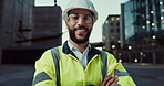 Face, construction site or happy man in city with arms crossed or smile for architecture or building. Engineering labor, night project and portrait of proud builder, confident worker and contractor