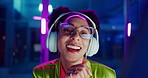 Neon, smile and woman with headphones, listening to audio and streaming music with internet. Person, home and lights with girl and headset for sound or radio with podcast and creative with confidence