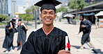 Face, graduation and arms crossed with student man outdoor on campus of college of university. Portrait, education and certificate with smile of young person laughing in celebration at ceremony