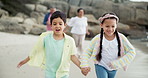 Children, holding hands and running with grandparents on beach for holiday exploring, happiness or traveling. Kids, old couple and ocean vacation in Florida for family adventure, weekend or bonding