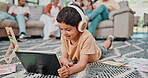 Child, headphones and education on floor with tablet for video call, math game or virtual class. Boy, tech and relax in living room with streaming for language development, knowledge and elearning