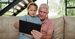 Girl, man or tablet as fun, learning or technology as mobile, gaming or app on sofa in home. Grandpa, child or touch screen to play, browse or read as elearning, streaming or bonding together