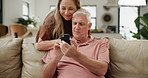 Home, old couple and cellphone with typing, connection and mobile user with social media and digital app. Apartment, senior man and mature woman with smartphone and marriage with help and teaching