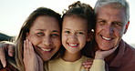 Happy, face and girl with grandparents at a beach for travel, bonding or having fun on vacation together. Love, portrait and senior people hug child in nature for holiday, reunion or weekend visit