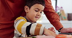 Father, son and cooking in kitchen for helping with sandwich, teaching and instructions for support. Family, man and child with breakfast preparation in home with meat, vegetables and conversation