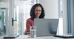 Smile, business woman and typing on laptop on desk at office for email, project or working in startup. Computer, table and professional reading information, blog and creative copywriter with article