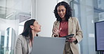 Business woman, laptop and team with tablet for planning, strategy or collaboration at the office. Female person, people or employees with technology in discussion or brainstorming at the workplace