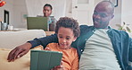 Parent, kid and learning with tablet on sofa for homeschool or online assessment and virtual education for courses. Dad, child and couch with touchscreen for digital literacy and growth development.