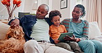 Parents, child and tablet on couch for online streaming entertainment with dog for relax weekend, movie or internet. Black family, son and watching on sofa with subscription together, resting or home