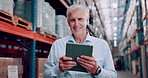 Tablet, logistics and senior man in warehouse checking information for order, stock or boxes. Smile, research and portrait of elderly male industry worker with digital technology in storage room.