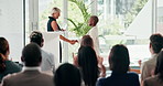 Award, solar presentation and handshake with woman talking to audience or crowd at green business event. Meeting, renewable energy workshop and applause of group of people at sustainability support