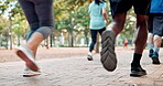 People, sneakers and running for race, fitness and workout in park for urban marathon club in Cancun. Diversity, runners and legs for cardio, health and wellness as exercise, training and sport