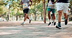 Group, legs and runners for fitness, exercise and training in park for urban marathon club in Miami. Diversity, people and sneakers for cardio, health and wellness as workout, practice and sport