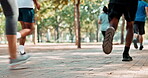 Group, legs and running for race, fitness and workout in park for urban marathon club in Atlanta. Diversity, people and sneakers for cardio, health and wellness as exercise, training and sport