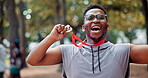 Black man, athlete and celebrate win with medal for success or goal , marathon and long distance running. Sportsman, achievement and victory for track outdoors, pride and fitness for sprinting race.