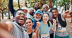 Group of people, smile and selfie of winning, fist pump or success in fitness, exercise or marathon. Excited, runners or friends for hand up to celebrate, victory or competition in park in Canada