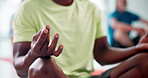 Hands, lotus and wellness in yoga class for peace, calm and mental health with meditation or mindfulness. Closeup of people on floor with spiritual, holistic and breathing exercise to relax or chakra