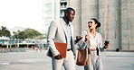 Business people, travel or walking in commute in city to work or office in conversation or outdoor discussion. Talking, employees and networking in urban area or Cape Town with luggage, man or woman 