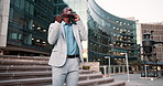 Businessman, excited or success on a phone call in city commute on outdoor travel in conversation. Win, employee talking or happy African entrepreneur networking in urban area or Cape Town for news