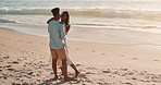 Couple, dancing and happy at beach for vacation with bonding, love and care with holding hands. People, African man and black woman with dancer, partner and moving on holiday for connection by ocean