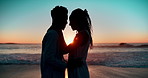 Couple, sunset and silhouette at beach with embrace, profile and together in nature for vacation in summer. Man, woman and hug with love, care and bonding with connection by ocean, waves or holiday