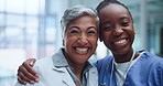 Happy women, face or doctors with hug in healthcare or collaboration in medical team in hospital. Specialist, nurse or friendly portrait with bonding, together or confident for job support in clinic
