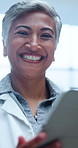 Mature woman, face or happy doctor on tablet, technology or online research for medical treatment. Specialist, healthcare or smile in portrait for connectivity or consulting on touchscreen in clinic