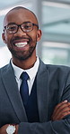 Face, glasses and arms crossed by businessman laughing in office with confidence, humor or friendly personality. Happy, portrait or African male consultant at startup with positive attitude or pride