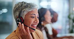 Senior woman, consultant and call center with headphones for customer service or support at office. Mature female person or happy agent with smile or consulting for online advice or help at workplace