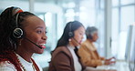 Black woman, call center and consulting with headphones in agency for customer service or support at office. African female person, team or happy agent talking for online advice or help at workplace